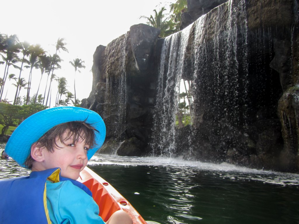 boyscanoeingaroundthewaterfall.jpg