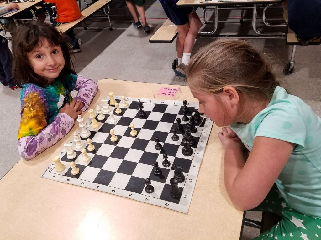 miaandlilaplayingchess.jpg